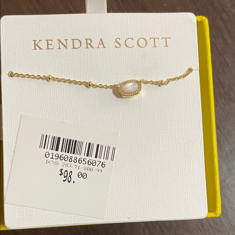 Kendra Scott Gold necklace with Oval White Stone